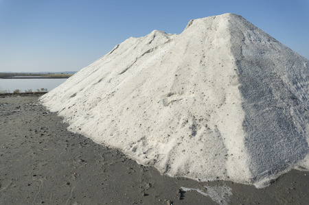 Big heap of sea salt extracted through natural evaporation at the salt lake near Burgas, Bulgariaの写真素材
