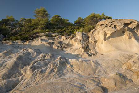 Unusual rock formations with strange shapes along the coast of Sythonia, Chalkidiki, Greece.の写真素材