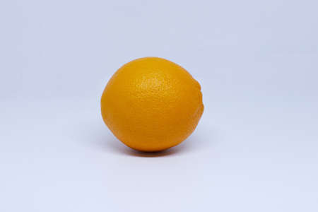 Ripe and fresh orange fruit on white background.の写真素材