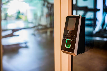 Facial recognition and fingerprints scanner machine for access door security