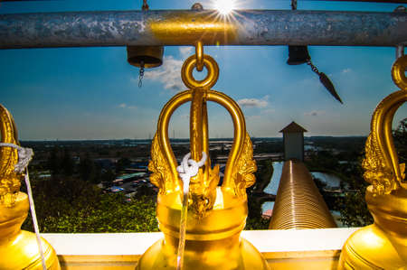 Bells in a buddhist temple of Thailandの写真素材