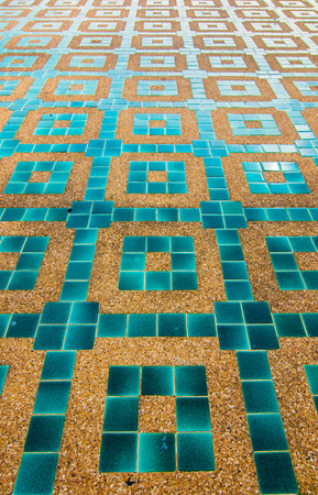 Painted tiles on floor in the garden.の写真素材