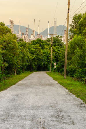 Road in Natural with Oil refinery industry Background in the countryの写真素材