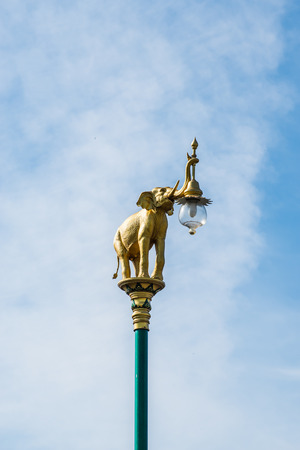 Lamp elephant statues on blue sky backgroundの写真素材