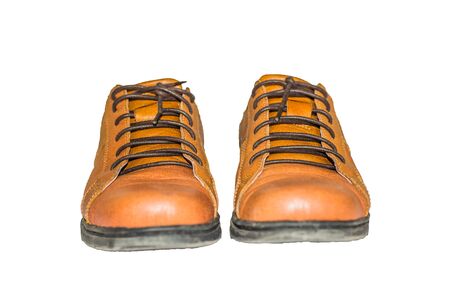 Brown leather shoes with white backgroundの写真素材