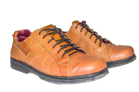 Brown leather shoes with white backgroundの写真素材
