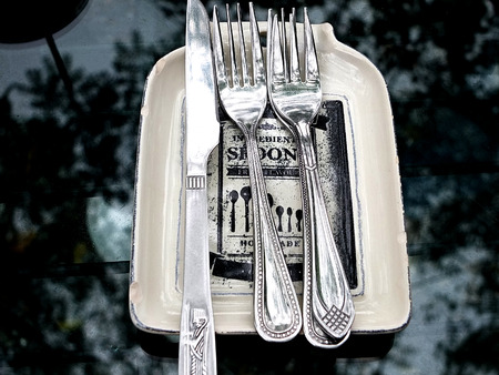 spoon and fork for cake at coffee shopの写真素材