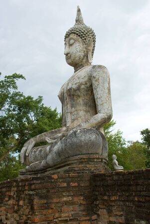 Buddha in sitting position in Sukhothai,Thailandの写真素材