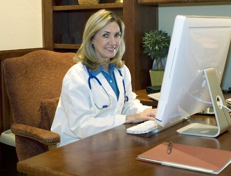 Female Doctor in her officeの写真素材