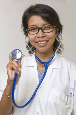 Doctor or Nurse standing with stethoscopeの写真素材