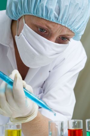 woman working in a science lab with equipmentの写真素材