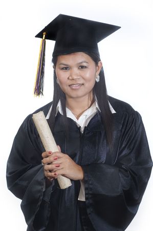 Young woman with graduation cap and gown の写真素材