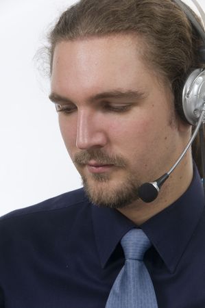 businessman with headset and friendly smileの写真素材