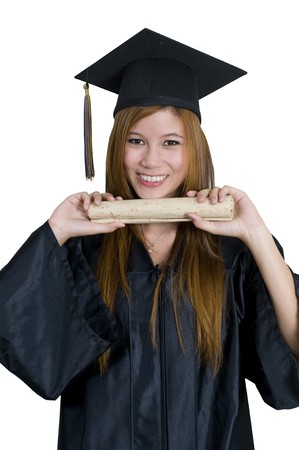 Young woman with graduation cap and gown holding diplomaの写真素材
