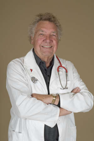 Portrait of happy and confident mature male Doctorの写真素材