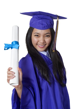 Young woman with graduation cap and gown の写真素材