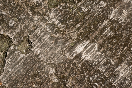 Grunge textured concrete sidewalk backgroundの写真素材