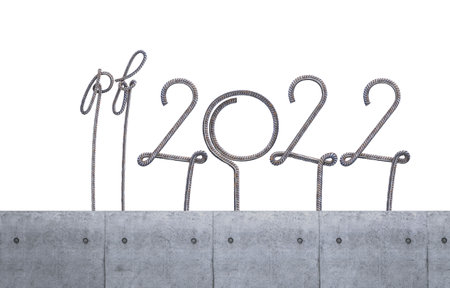 2022 shaped digits made of steel reinforcement in concrete on a white background