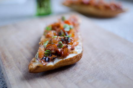 Grilled bread with tomatoes, garlic, home madeの写真素材