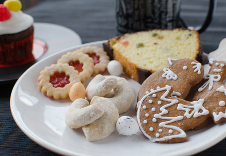 Homemade cookies with muffin, cup of teaの写真素材