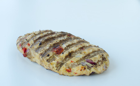 Grilled chicken isolated with paprika, garlic and corianderの写真素材