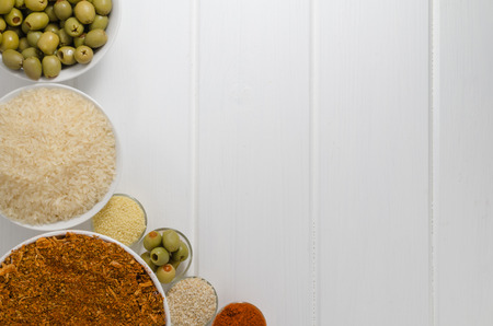 Spices on white wood, focus on allの写真素材