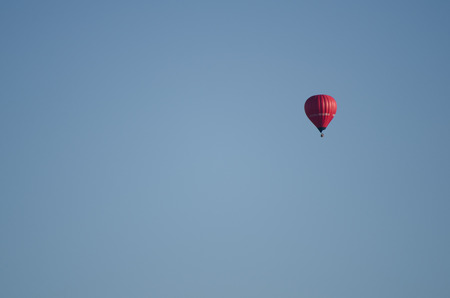 Blue sky and hot air balloon - red one