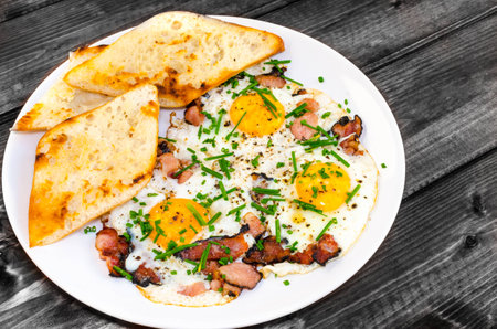 Bacon, eggs and chive with crispy toast, bio product