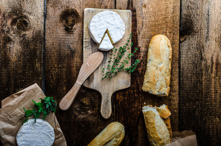 Camembert, soft cheese with homemade pastries, old schoolの写真素材