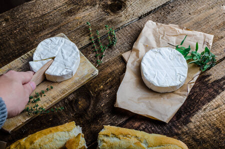 Camembert, soft cheese with homemade pastries, old schoolの写真素材