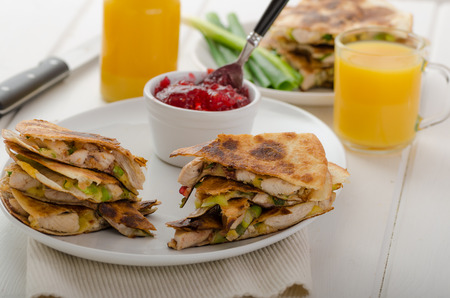 Turkey quesadillas with currant sauce, fresh orange juiceの写真素材