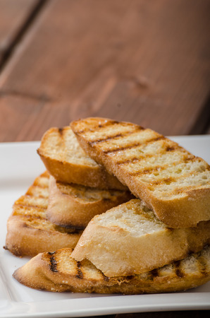 Garlic toast, mini baguettes, fresh and fragrant, bio garlic