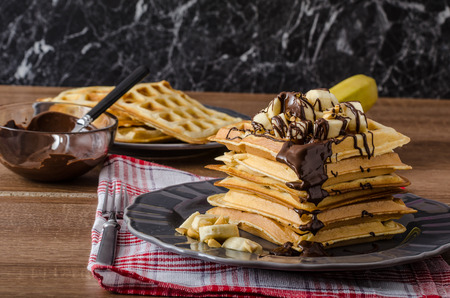 The original Belgian waffles with bananas, nuts and chocolateの写真素材