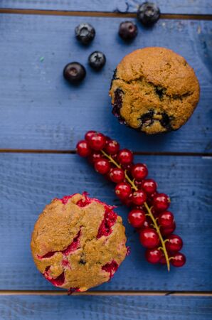Homemade muffins made from rye flour with red velvet and blueberriesの写真素材