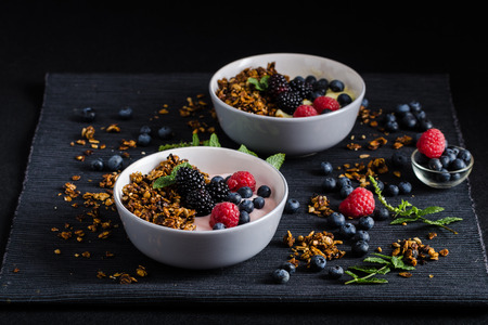 Homemade pudding - strawberry and banana with berriesの写真素材