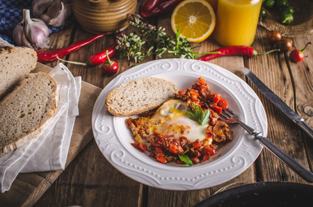 Shakshuka - Eggs Poached in Spicy Tomato Pepper Sauceの写真素材