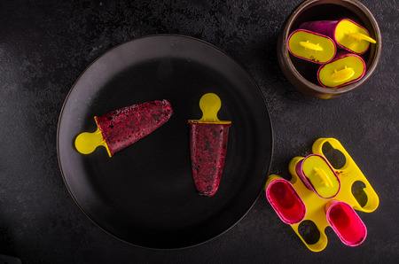 Homemade ice lolly from forest berries