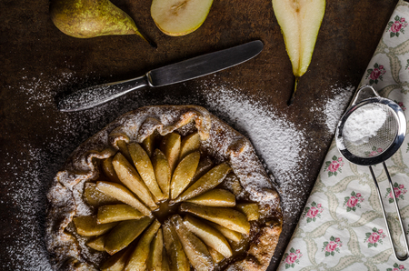 Sweet pear pie rustic style, simple product photo ready for your advertisingの写真素材