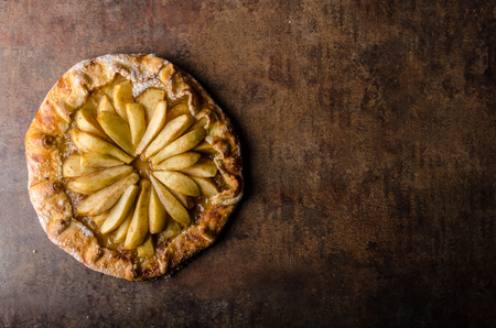Sweet pear pie rustic style, simple product photo ready for your advertisingの写真素材