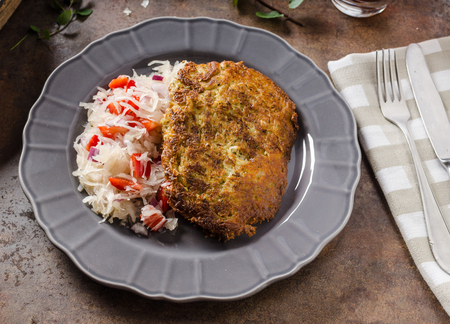 Potato pancakes with coleslaw, place for your advertisingの写真素材