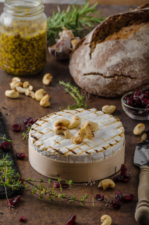 Grilled camembert cheese, delicious and fast food with creamy cheeseの写真素材