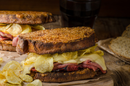 French toast salty style, with meat and chips, rustic styled photoの写真素材
