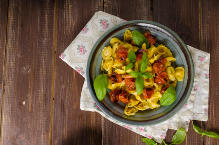 Tortellini with roasted vegetable and herbs, homemade pasta semolina flourの写真素材