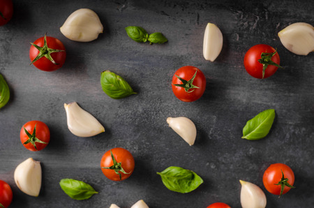 Tomato garlic basil background, product photography, ready for advertisingの写真素材