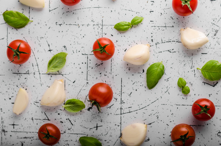 Tomato garlic basil background, product photography, ready for advertisingの写真素材