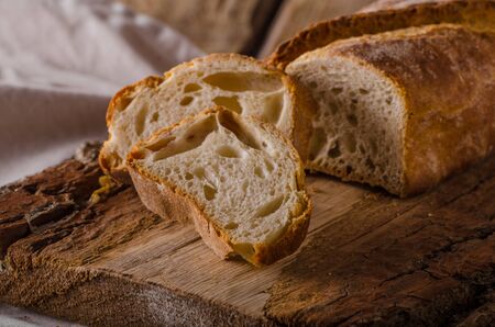 Ciabatta bread product photo, place for advertising, styled rustic photo