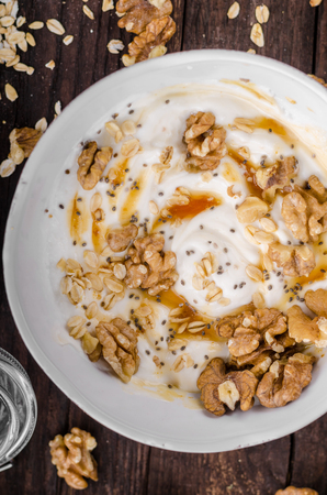 Fresh cheese with honey and walnuts, food photography, food stylindの写真素材