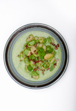 Gnocchi with bacon and basil spinach sauce, delish food photography, food advertismentの写真素材