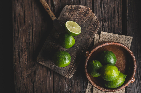 Fresh lime on wood board, bio fruit, food photography, food stockの写真素材