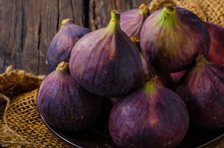 Fresh figs on wood board, delish fruit, food photography